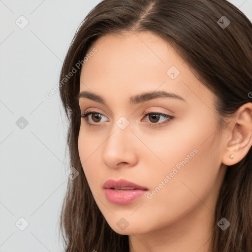 Neutral white young-adult female with long  brown hair and brown eyes