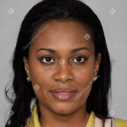 Joyful black young-adult female with long  brown hair and brown eyes