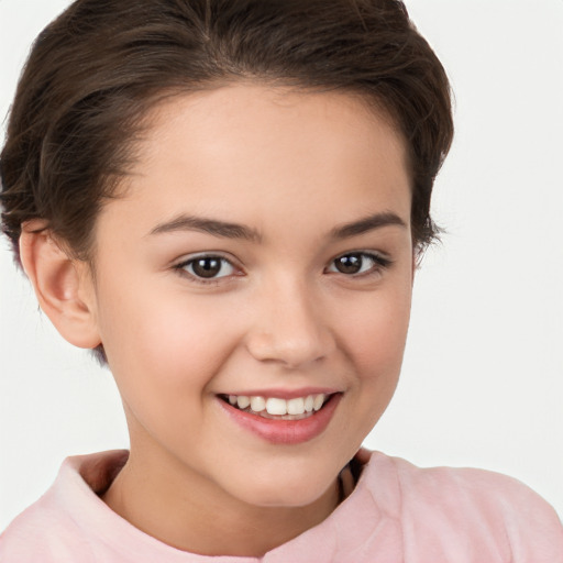 Joyful white child female with short  brown hair and brown eyes