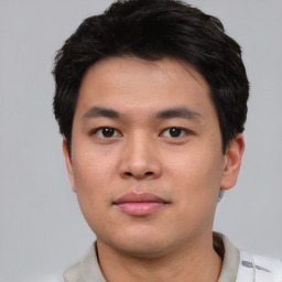 Neutral asian young-adult male with short  black hair and brown eyes