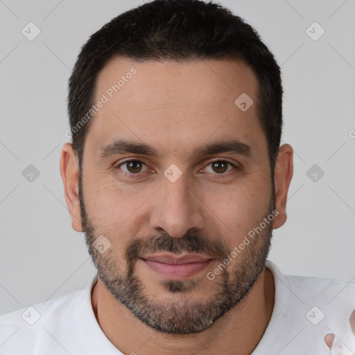 Joyful white young-adult male with short  brown hair and brown eyes