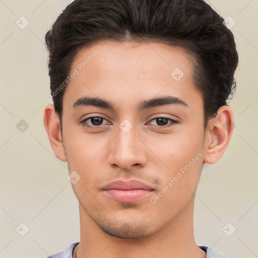 Neutral white young-adult male with short  brown hair and brown eyes