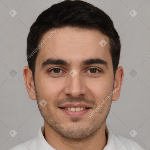 Joyful white young-adult male with short  brown hair and brown eyes