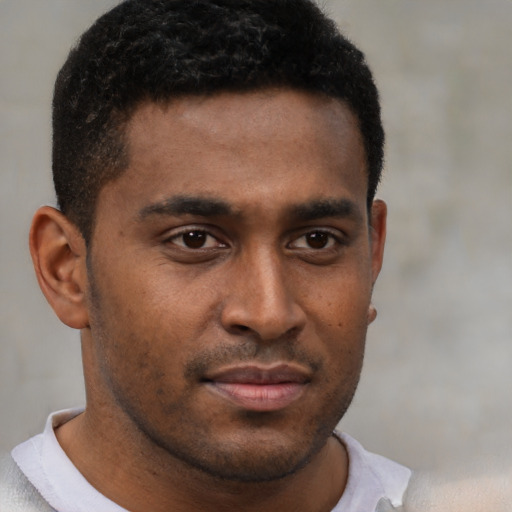 Neutral black young-adult male with short  brown hair and brown eyes
