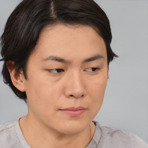 Neutral asian young-adult female with short  brown hair and brown eyes