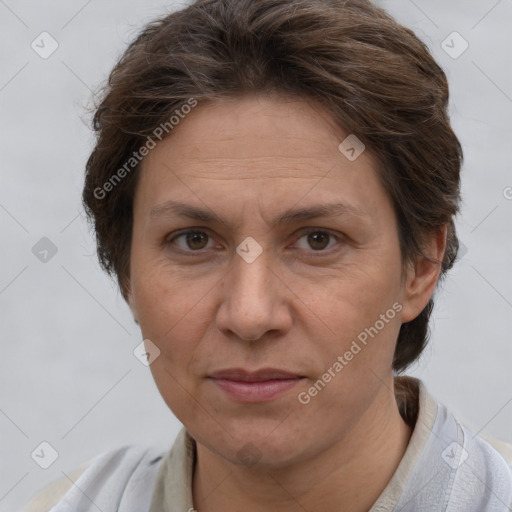 Joyful white adult female with short  brown hair and brown eyes