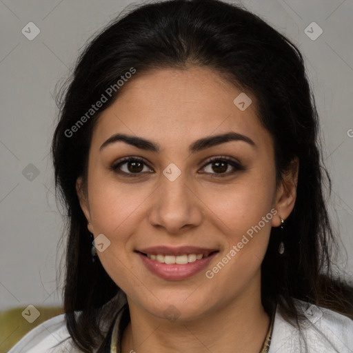 Joyful latino young-adult female with medium  brown hair and brown eyes