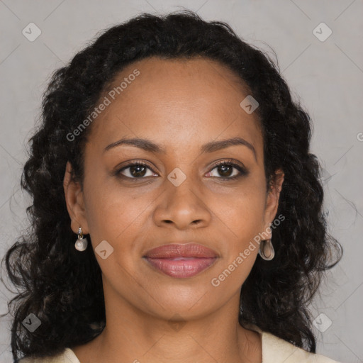 Joyful black young-adult female with long  brown hair and brown eyes