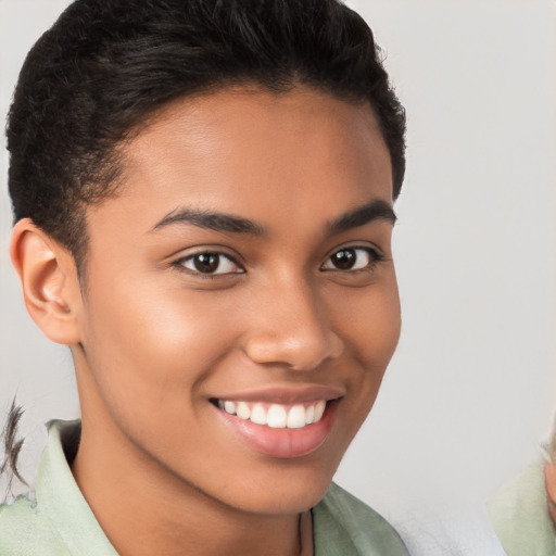 Joyful latino young-adult female with short  brown hair and brown eyes