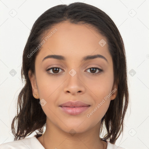 Joyful latino young-adult female with medium  brown hair and brown eyes