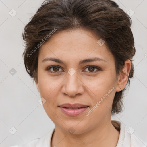 Joyful white adult female with short  brown hair and brown eyes