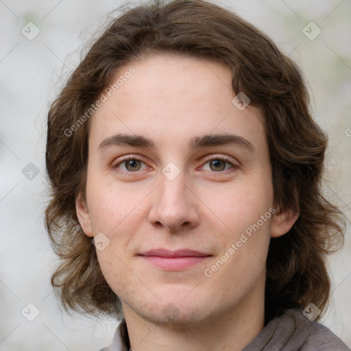 Joyful white young-adult female with medium  brown hair and green eyes