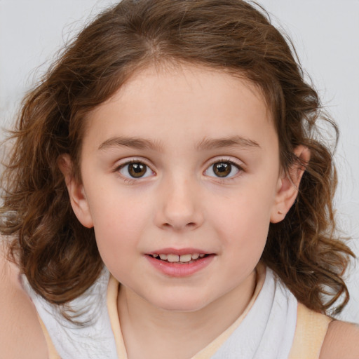 Joyful white child female with medium  brown hair and brown eyes