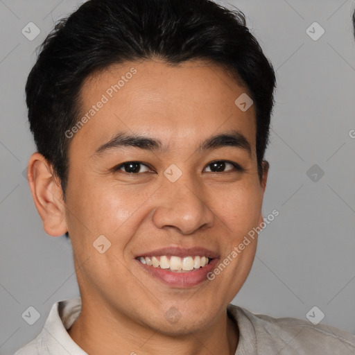 Joyful white young-adult male with short  black hair and brown eyes