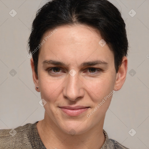 Joyful white young-adult female with short  brown hair and grey eyes