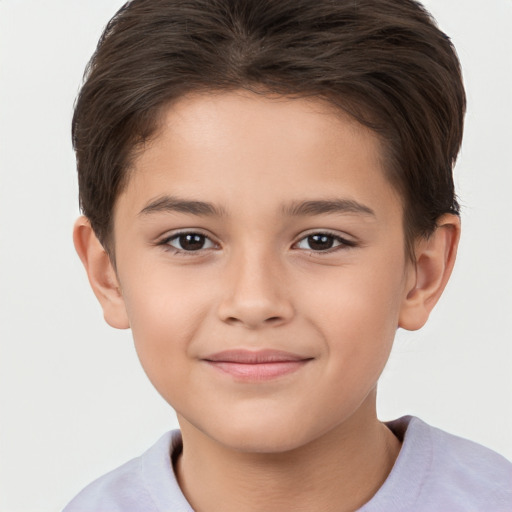 Joyful white child female with short  brown hair and brown eyes