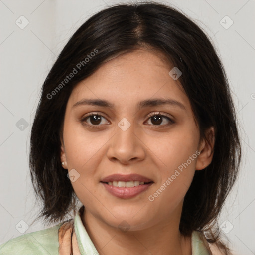 Joyful latino young-adult female with long  brown hair and brown eyes