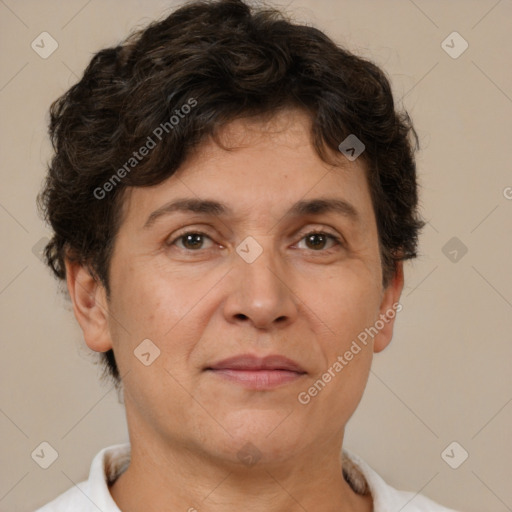 Joyful white adult female with short  brown hair and brown eyes