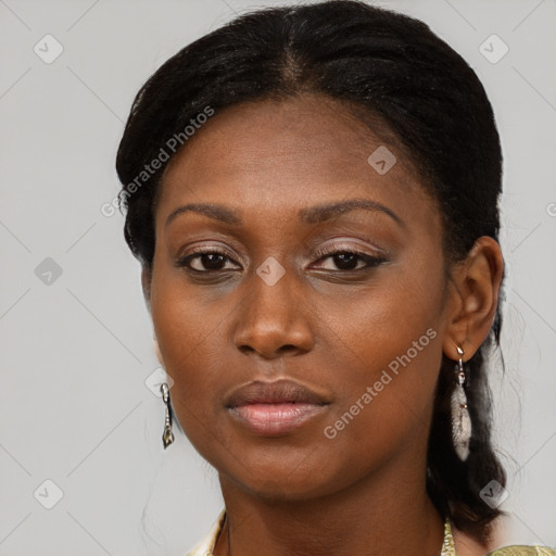 Neutral black young-adult female with medium  brown hair and brown eyes