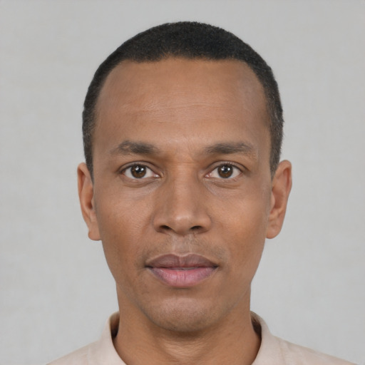 Neutral black young-adult male with short  black hair and brown eyes