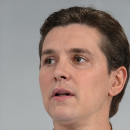 Neutral white adult male with short  brown hair and brown eyes