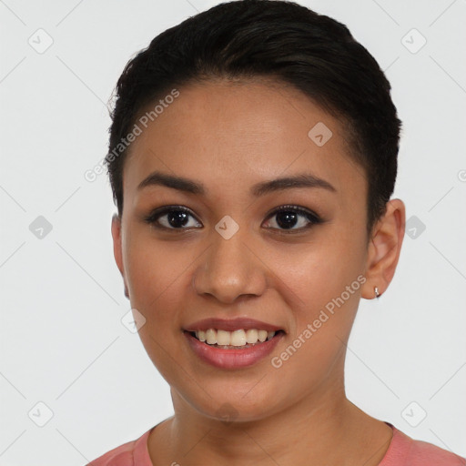 Joyful asian young-adult female with short  black hair and brown eyes