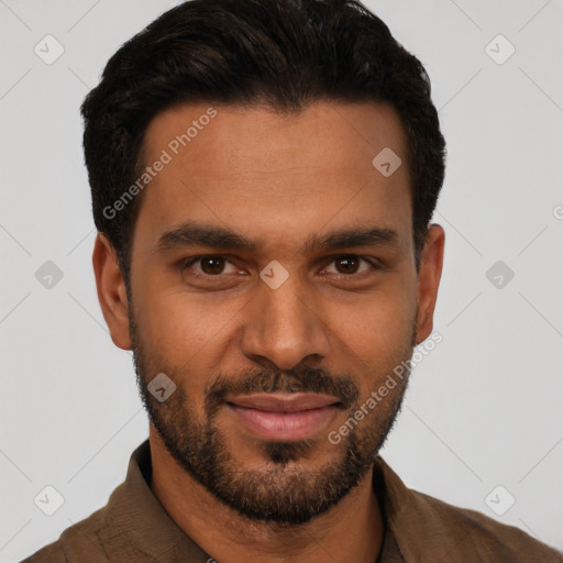 Joyful latino young-adult male with short  black hair and brown eyes