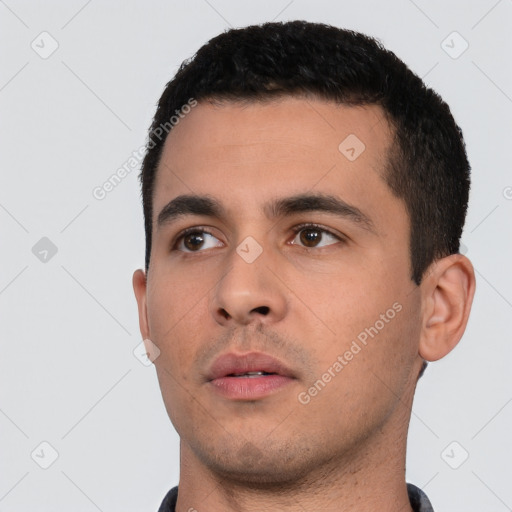 Neutral white young-adult male with short  black hair and brown eyes