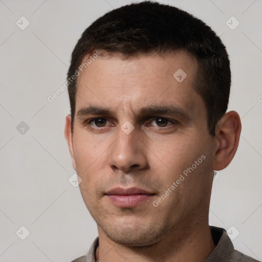 Neutral white young-adult male with short  brown hair and brown eyes