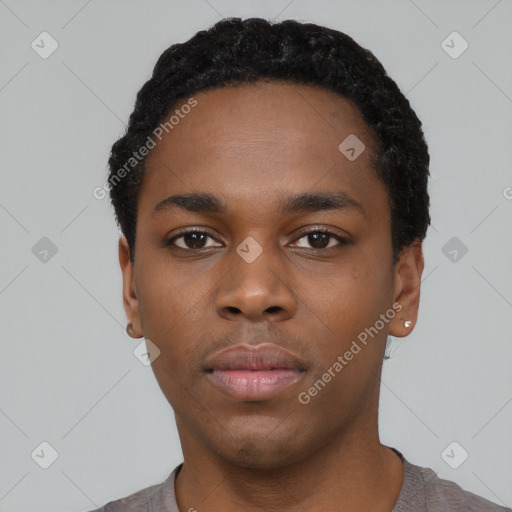 Neutral black young-adult male with short  black hair and brown eyes