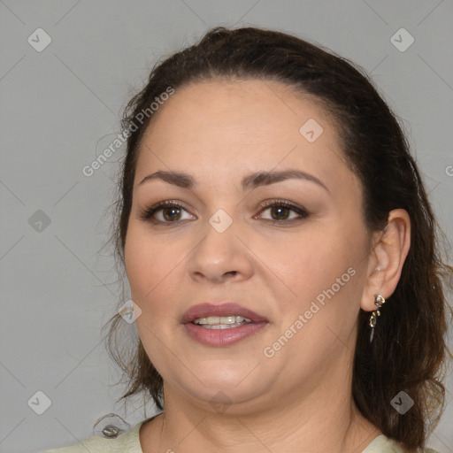 Joyful white adult female with medium  brown hair and brown eyes