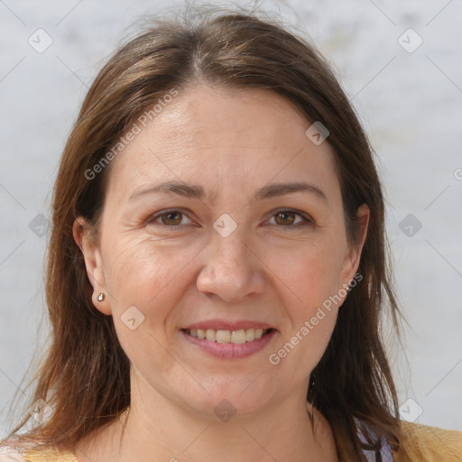 Joyful white adult female with medium  brown hair and brown eyes