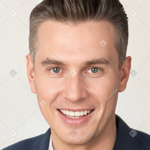 Joyful white adult male with short  brown hair and brown eyes