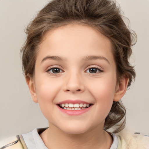 Joyful white child female with medium  brown hair and brown eyes