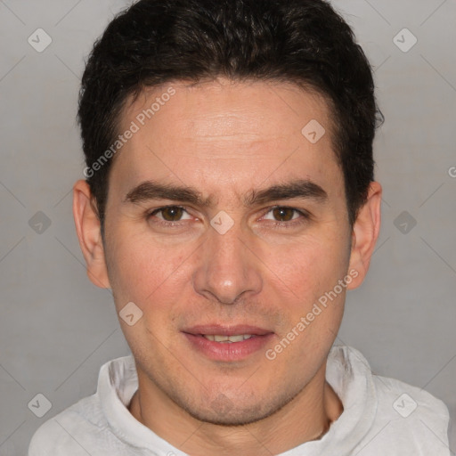 Joyful white adult male with short  brown hair and brown eyes