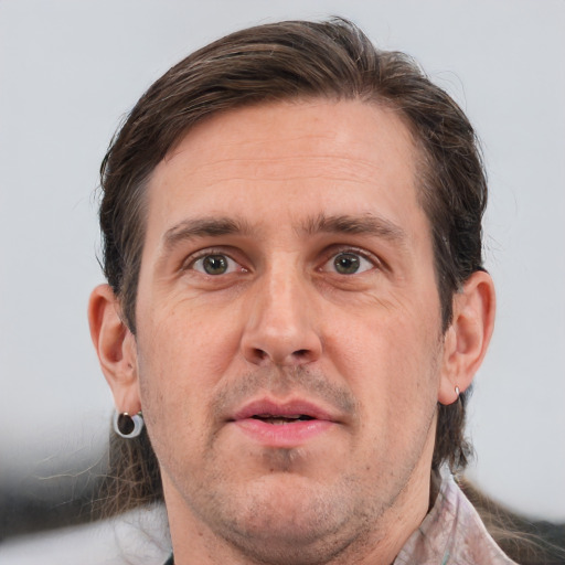 Neutral white adult male with short  brown hair and brown eyes