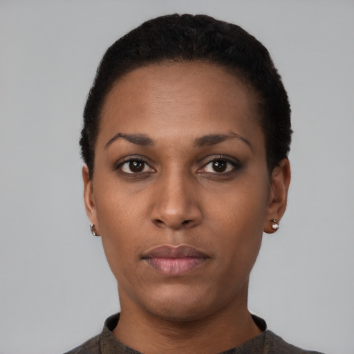 Neutral black young-adult female with short  black hair and brown eyes