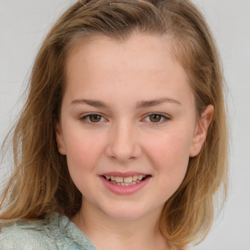 Joyful white child female with medium  brown hair and brown eyes