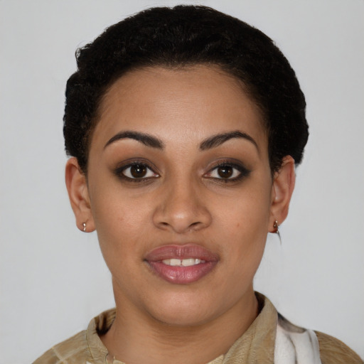 Joyful latino young-adult female with short  brown hair and brown eyes