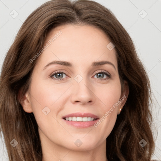 Joyful white young-adult female with long  brown hair and green eyes