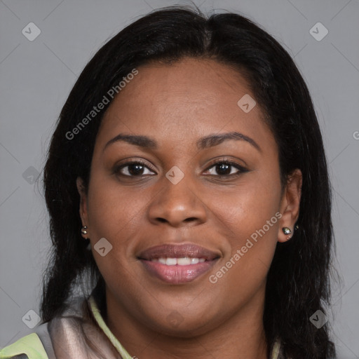 Joyful latino young-adult female with long  brown hair and brown eyes