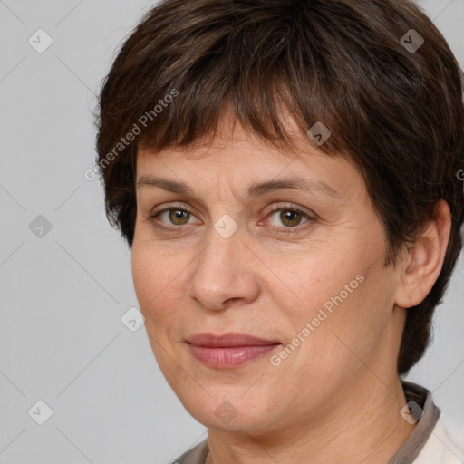 Joyful white adult female with short  brown hair and brown eyes