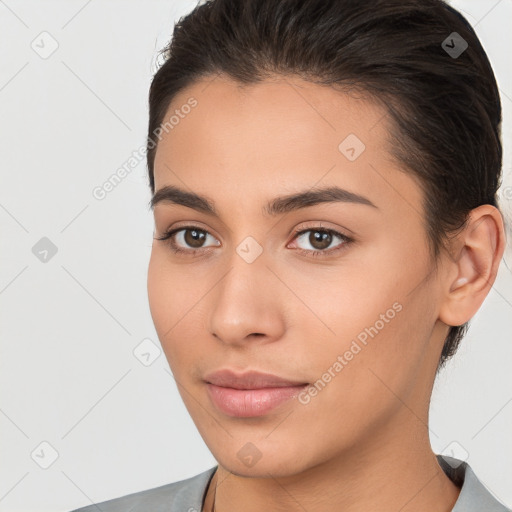 Neutral white young-adult female with short  brown hair and brown eyes