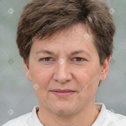 Joyful white adult male with short  brown hair and grey eyes