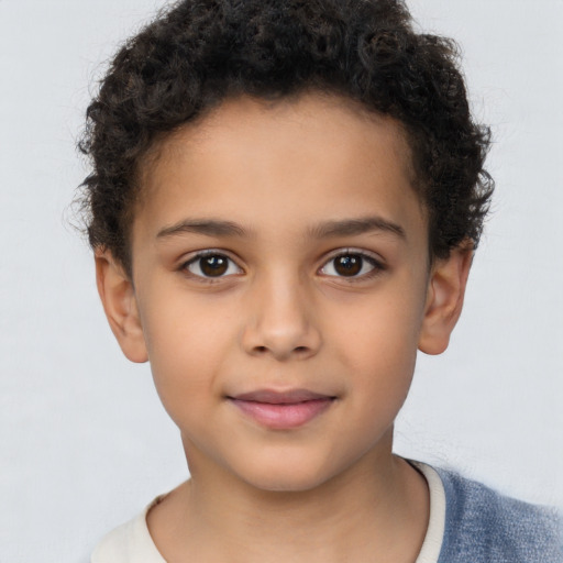 Neutral latino child male with short  brown hair and brown eyes