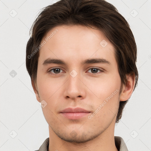 Neutral white young-adult male with short  brown hair and brown eyes