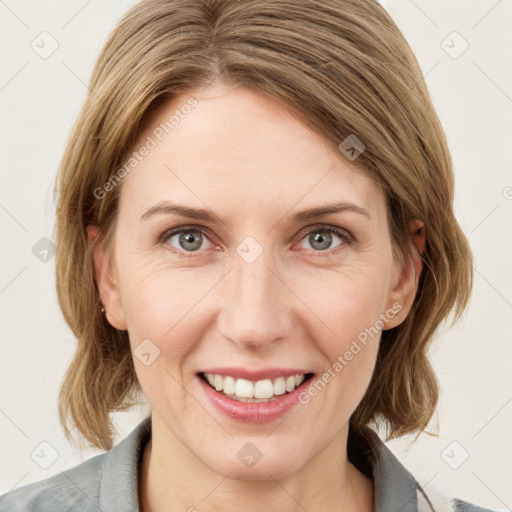 Joyful white young-adult female with medium  brown hair and blue eyes