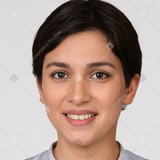 Joyful white young-adult female with short  brown hair and brown eyes