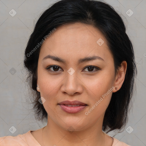 Joyful asian young-adult female with medium  brown hair and brown eyes