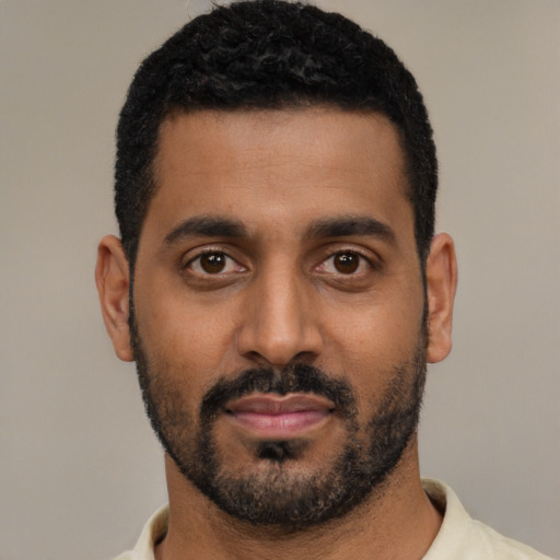 Neutral black young-adult male with short  black hair and brown eyes